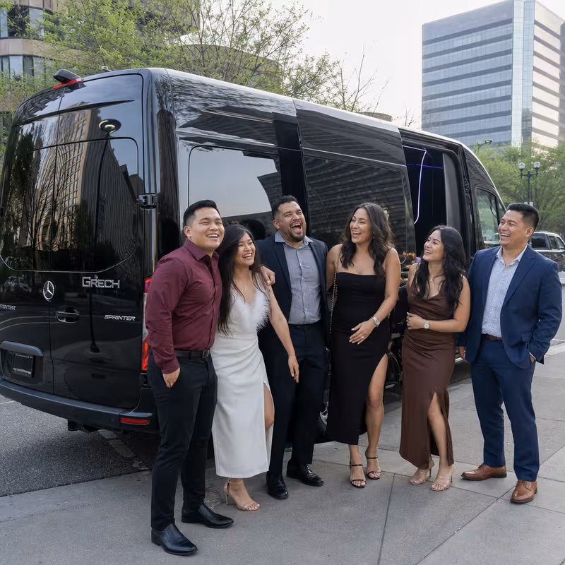 Group boarding a white charter bus for Bachelor & Bachelorette Transportation transportation in San Jose