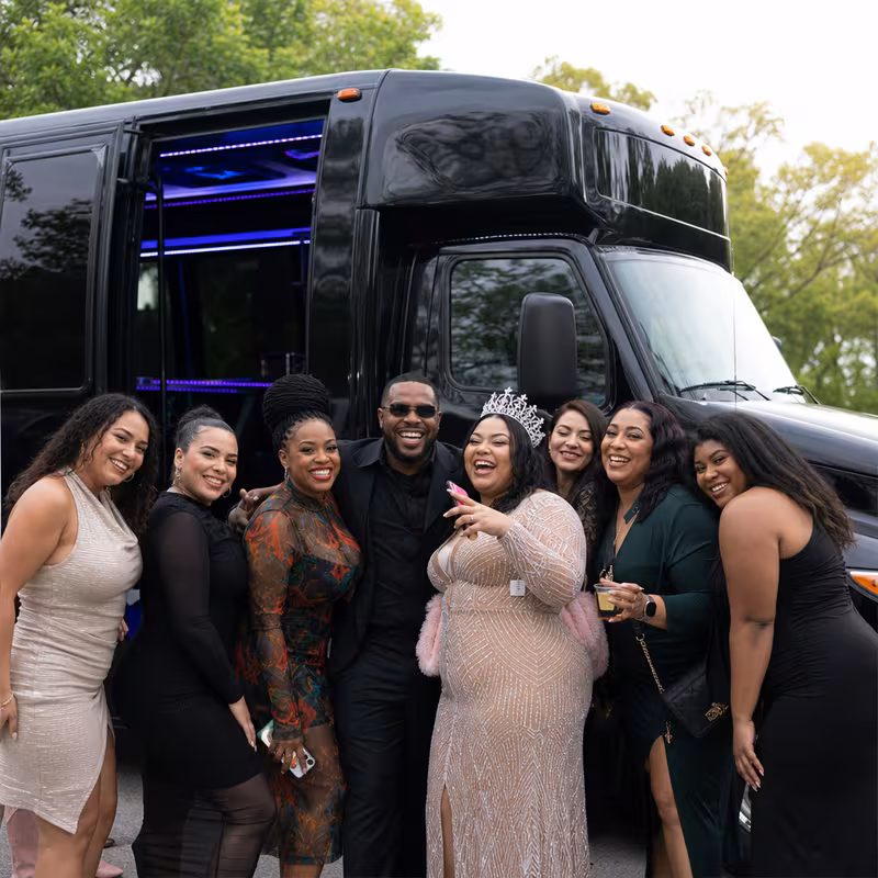 Party bus interior with wraparound leather seating and LED lighting in San Jose