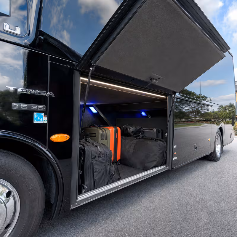 Party bus interior with wraparound leather seating and LED lighting in San Jose